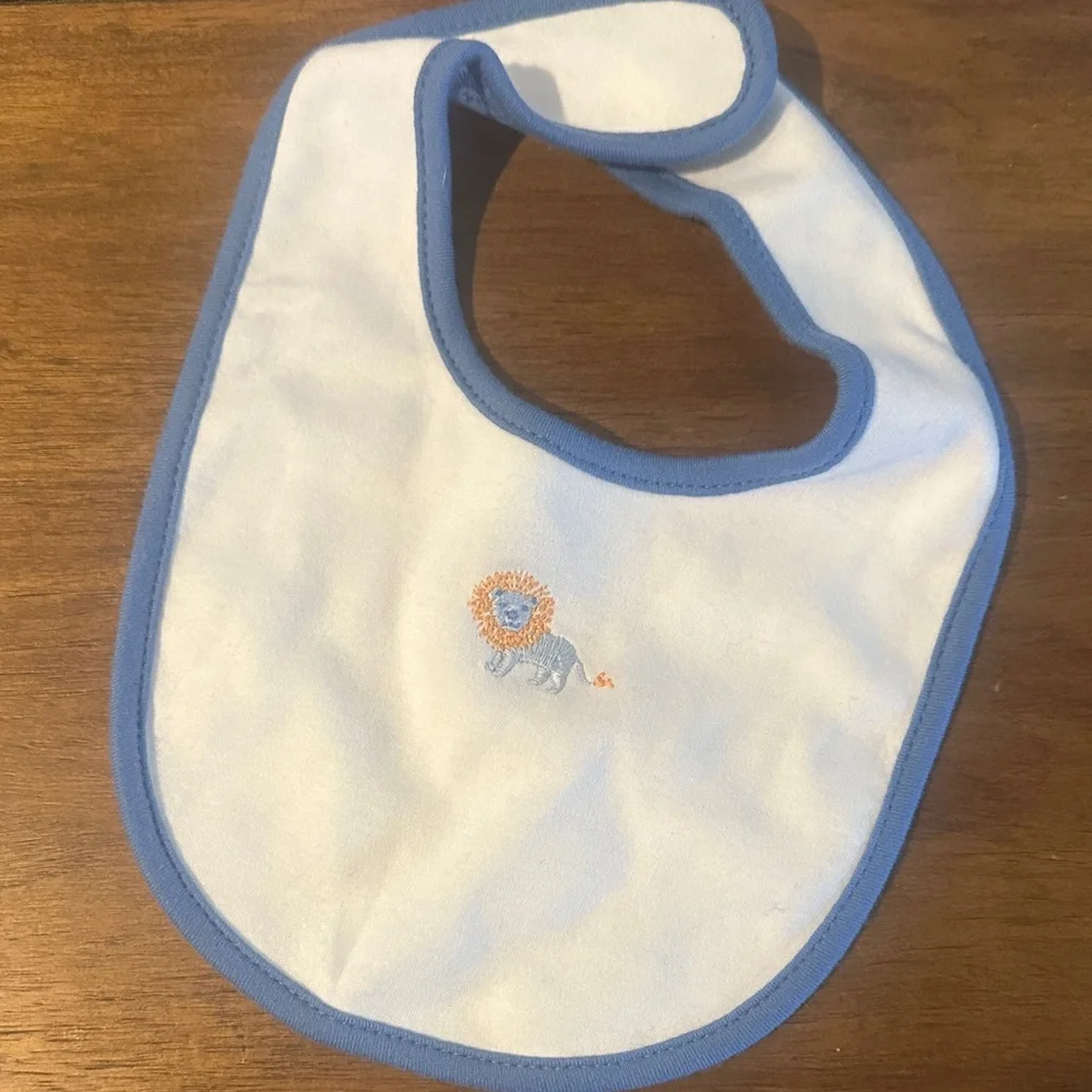 Janie and Jack White Bib with Blue Trim and Embroidered Lion Accent